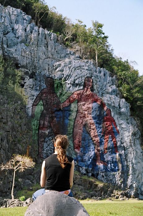 Galia is looking at a giant modern fresco (made in the 50's), describing the pre-historic age, near Viniales