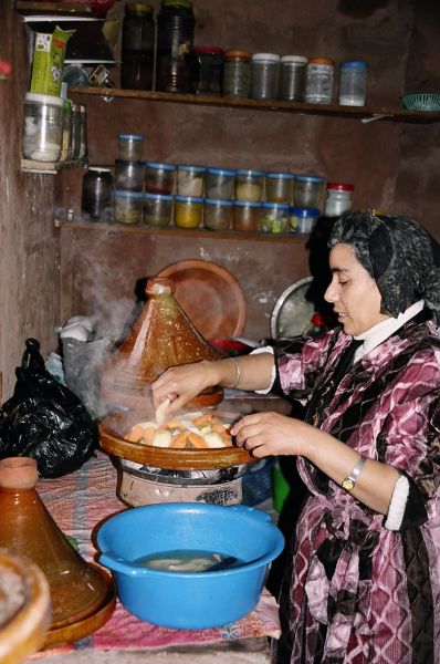 Cooking Kuskus over Tagine inside a Berber home, Ourika Valley