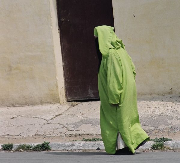 Moroccan woman wearing Kaftan and Niqab (a face veil)