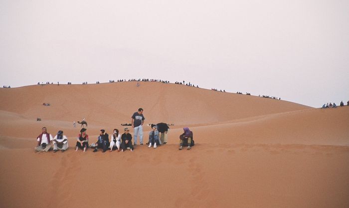 Our group and other tourists are spread all over Merzouga dunes to watch the sunrise