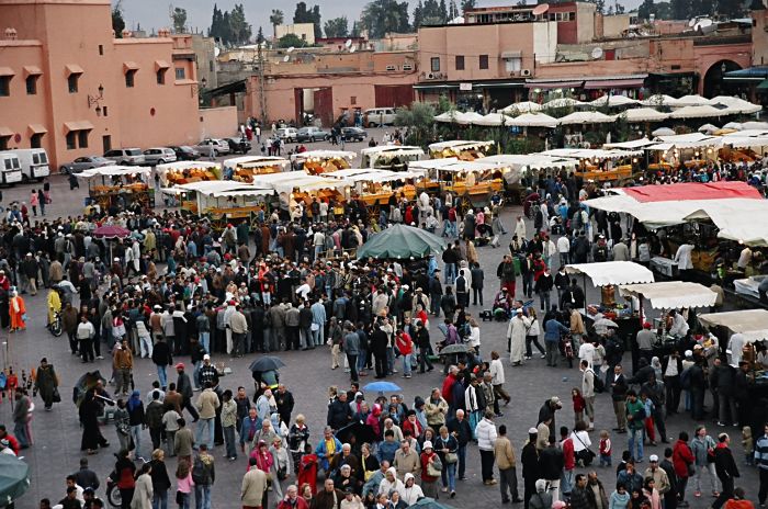 Jemma el Fna, Marrakesh's facinating square, is crowded with storytellers, orange juice stalls, jugglers, mystics, etc.